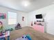 Playful bedroom with themed decor and built-in storage at 6163 Forest Ridge Way, Winter Haven, FL 33881
