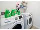 Convenient laundry room with washer and dryer at 6163 Forest Ridge Way, Winter Haven, FL 33881