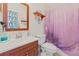Clean bathroom with shower/tub and wood vanity at 7403 Glen Oaks Way # 82, Winter Park, FL 32792