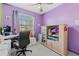 Versatile bedroom used as a home office with desk and chair at 7403 Glen Oaks Way # 82, Winter Park, FL 32792