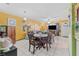 Dining area with a round table and four chairs at 7403 Glen Oaks Way # 82, Winter Park, FL 32792