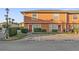 Front view of a two-story townhome with parking at 7403 Glen Oaks Way # 82, Winter Park, FL 32792