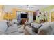 Spacious living room with gray sofas and a flat-screen TV at 7403 Glen Oaks Way # 82, Winter Park, FL 32792