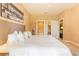 Comfortable bedroom with a luxurious bed, walk-in closet, and ensuite bathroom at 7535 Brooklyn Dr, Kissimmee, FL 34747