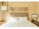 Bright bedroom with a luxurious bed and neutral accents at 7535 Brooklyn Dr, Kissimmee, FL 34747
