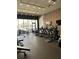 Modern gym featuring a variety of exercise equipment, including treadmills and exercise bikes at 7535 Brooklyn Dr, Kissimmee, FL 34747
