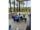 Inviting playroom featuring animal seating, a blue table, and views of palm trees at 7535 Brooklyn Dr, Kissimmee, FL 34747