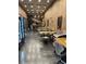 Spacious restaurant interior with tables, chairs, and refrigerated display cases at 7535 Brooklyn Dr, Kissimmee, FL 34747