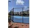 Community tennis court with modern equipment and outdoor setting at 7535 Brooklyn Dr, Kissimmee, FL 34747