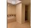 Relaxing bathroom with soaking tub and a separate shower at 8749 The Esplanade # 29, Orlando, FL 32836