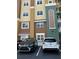 Building exterior with parking and landscaping at 8749 The Esplanade # 29, Orlando, FL 32836