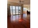 Living room with hardwood floors and water views at 8749 The Esplanade # 29, Orlando, FL 32836