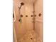 Walk-in shower with grab bars and multiple shower shelves at 8749 The Esplanade # 29, Orlando, FL 32836