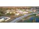 Aerial view of house and surrounding neighborhood at 1001 Dampierre Ct, Kissimmee, FL 34759