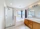 Bathroom features double vanity, shower, and garden tub at 1001 Dampierre Ct, Kissimmee, FL 34759