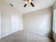 Bright bedroom with double door closet and window at 1001 Dampierre Ct, Kissimmee, FL 34759