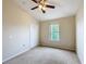 Spacious bedroom with closet and window at 1001 Dampierre Ct, Kissimmee, FL 34759