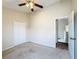 Bedroom with vaulted ceiling, ceiling fan and closet at 1001 Dampierre Ct, Kissimmee, FL 34759