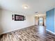 Dining room with wood-look floors and a chandelier at 1001 Dampierre Ct, Kissimmee, FL 34759