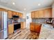 Modern kitchen with stainless steel appliances and granite countertops at 1001 Dampierre Ct, Kissimmee, FL 34759