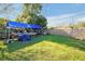 Backyard with boat, canopy, and grassy area at 112 Azalea Ln, Sanford, FL 32773