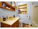 Clean bathroom with wood vanity, and a bathtub at 112 Azalea Ln, Sanford, FL 32773