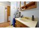Simple bathroom with wood vanity, and a bathtub at 112 Azalea Ln, Sanford, FL 32773