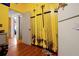 Laundry area with washer, dryer, and fishing rod storage at 112 Azalea Ln, Sanford, FL 32773
