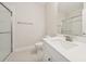 Bathroom features a modern vanity, sleek fixtures, and a glass-enclosed shower for a spa-like experience at 13200 Faro Ct # 44, Winter Garden, FL 34787