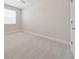 Bright bedroom with neutral walls, carpet, and a window offers a serene and relaxing space at 13200 Faro Ct # 44, Winter Garden, FL 34787