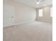 Spacious bedroom with plush carpeting, neutral walls, and plenty of natural light creates a relaxing retreat at 13200 Faro Ct # 44, Winter Garden, FL 34787
