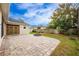 Spacious backyard with fire pit and brick pavers at 13442 Old Dock Rd, Orlando, FL 32828