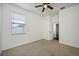 Bedroom with ceiling fan and window blinds at 13442 Old Dock Rd, Orlando, FL 32828