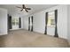 Spacious bedroom with neutral carpeting and large windows at 13442 Old Dock Rd, Orlando, FL 32828