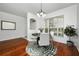 Bright dining room with hardwood floors and a round table at 13442 Old Dock Rd, Orlando, FL 32828