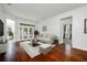 Bright living room with hardwood floors and access to backyard at 13442 Old Dock Rd, Orlando, FL 32828