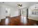 Spacious living room, hardwood floors and backyard access at 13442 Old Dock Rd, Orlando, FL 32828