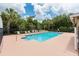 Community pool with plenty of lounge chairs at 13442 Old Dock Rd, Orlando, FL 32828