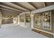 Modern back patio with French doors leading to the backyard and a view of the pool at 1404 N Cove Blvd, Longwood, FL 32750