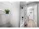 Bathroom with walk-in shower and laundry closet at 1404 N Cove Blvd, Longwood, FL 32750