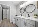 Modern bathroom with double vanity and gray cabinets at 1404 N Cove Blvd, Longwood, FL 32750