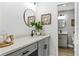 Modern bathroom with gray cabinets and a white quartz countertop at 1404 N Cove Blvd, Longwood, FL 32750