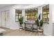 Bright and airy entryway with a stylish console table and large windows at 1404 N Cove Blvd, Longwood, FL 32750