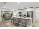 Modern kitchen with white cabinets and expansive island at 1404 N Cove Blvd, Longwood, FL 32750