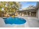 Enjoy this beautiful pool and spa with a spacious patio area at 1404 N Cove Blvd, Longwood, FL 32750