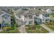 Two story house in a community with similar homes at 1564 Flange Dr, Davenport, FL 33896