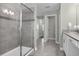Bathroom with walk-in shower and single vanity at 1564 Flange Dr, Davenport, FL 33896