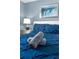 Bedroom with a comfortable queen-size bed and nightstands at 1564 Flange Dr, Davenport, FL 33896