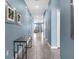 Bright hallway with tile floors and light walls at 1564 Flange Dr, Davenport, FL 33896