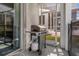 Stainless steel grill with propane tank on the patio at 1564 Flange Dr, Davenport, FL 33896